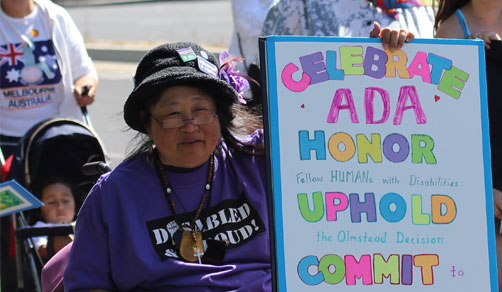 Photo of organizer in San Jose for Disability Pride Parade.