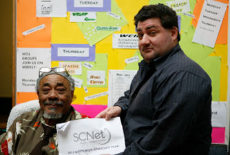 Photo of two men at an independent living center.